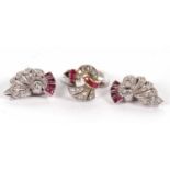 A mid 20th century diamond and ruby Odeonesque ring and matching earrings, the ring set with a