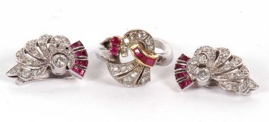A mid 20th century diamond and ruby Odeonesque ring and matching earrings, the ring set with a