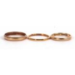 Three 9ct rings, to include a plain 3mm wide wedding band, Birmingham 1955, size M-N; a 2mm wide