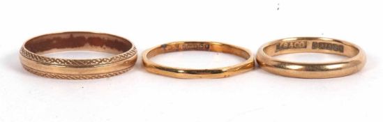 Three 9ct rings, to include a plain 3mm wide wedding band, Birmingham 1955, size M-N; a 2mm wide