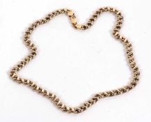 A 9ct fancy link necklace, the criss-cross style links stamped 375 to one end, with lobster clasp
