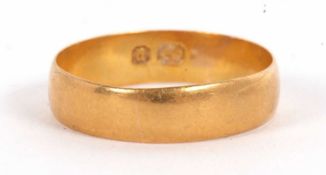 A gold wedding band, hallmarked Birmingham 1898, (other marks worn, tests as approx. 18ct gold),