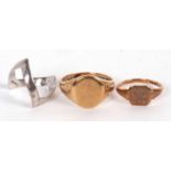 Three gold rings: an 18ct white gold wishbone ring, hallmarked London 1976, size L-M, 3.1g; a