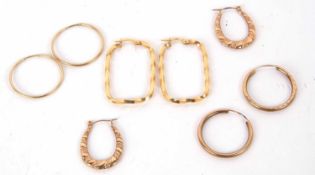 Four pairs of variously marked 9ct earhoops, 4.3g gross