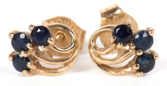 A pair of 9ct and sapphire earrings, with three fronds each set with a small round sapphire, each