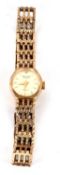 A ladies 9ct Acurist wristwatch, the oval named dial with baton numerals, stamped 375, with fancy