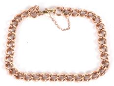 A 9ct rose gold curblink bracelet, each link stamped 375, with later lobster claw clasp stamped 375,