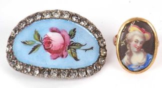 A portrait ring and paste brooch, the ring set with a collet mounted oval porcelain plaque painted