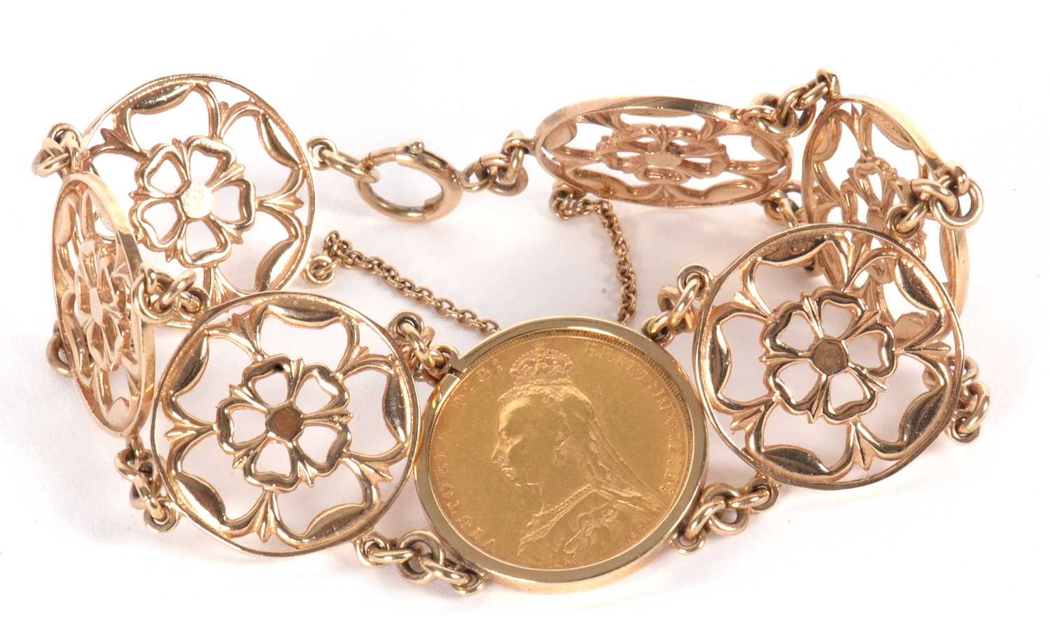 A 9ct mounted sovereign bracelet, the 1889 sovereign in mount stamped 375 (other marks worn), set to - Image 4 of 4