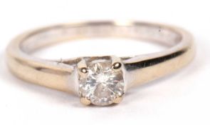 A diamond solitaire ring, the round brilliant cut diamond, approx. 0.33cts, in a four claw mount
