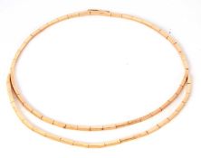 A fancy link necklace, the elongated square link necklace the extra half length drop strand, with