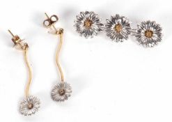 A 9ct Clogau two tone daisy brooch and matching earrings, the three daisy brooch in white gold