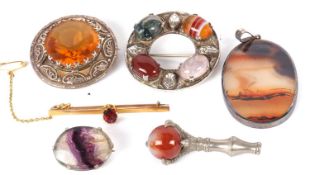 A mixed group of gemset jewellery to include a round Cairngorm style silver brooch by Robert