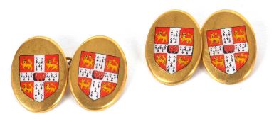A pair of Cambridge University cufflinks, the oval discs, each set with a sheild with Cambridge