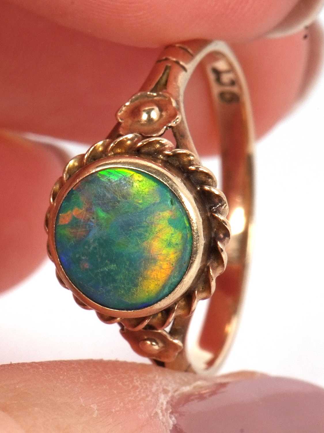 A 9ct opal ring,the round opal cabochon, collet mounted with rope twist border and closed back, 10. - Image 9 of 11