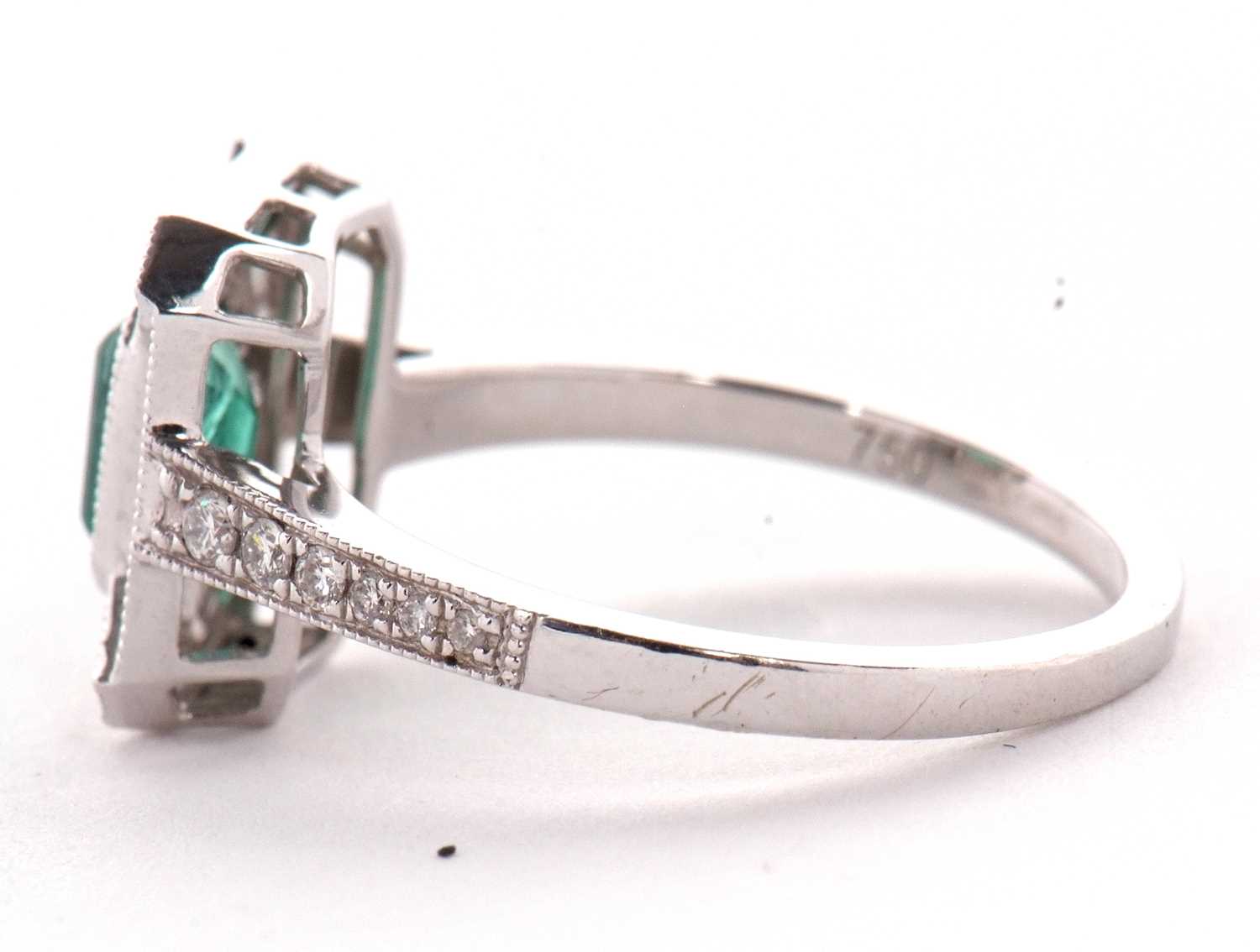 An 18ct emerald and diamond Art Deco style ring, the central emerald cut emerald surrounded by small - Image 5 of 6
