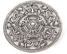 A silver brooch by David Andersen, the round brooch with allover Celtic design, stamped to