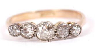 A five stone diamond ring, the five graduated old mine cut diamonds, total estimated approx. 0.