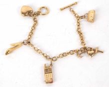 A charm bracelet, with tag stamped 375, 17.5cm long, 5.0g