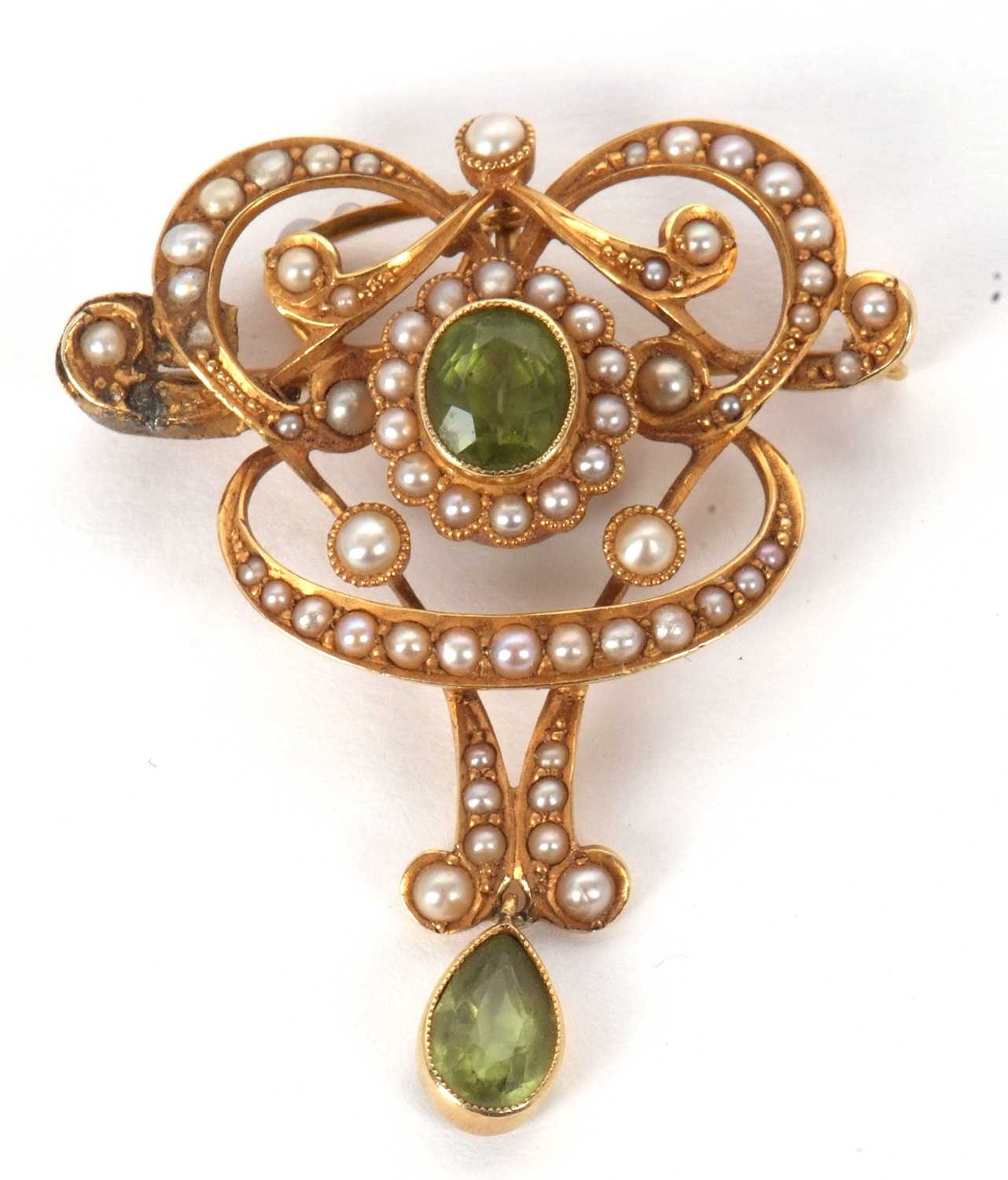 Two gemset brooches, the first an Art Nouveau peridot and seed pearl brooch/pendant, 32mm wide, - Image 3 of 6