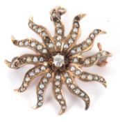 A seed pearl and diamond star brooch/pendant, the seed pearl set star with curved points and central