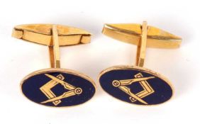 A pair of 9ct Masonic cufflinks, the oval blue enamelled discs with Masonic symbolism, hallmarked to