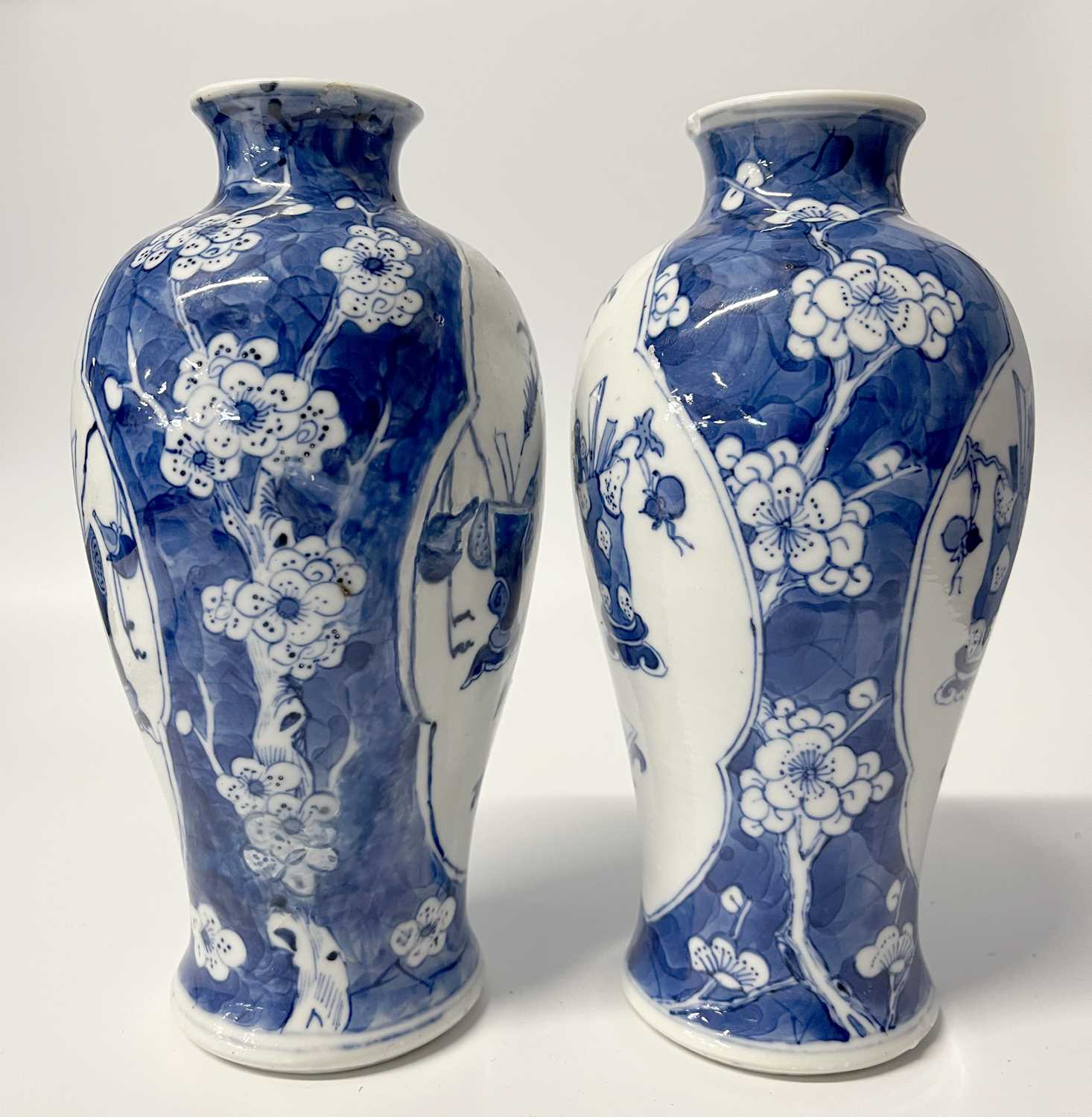 A pair of small Chinese porcelain vases in Qing Shi style with panels decorated with precious - Image 2 of 8