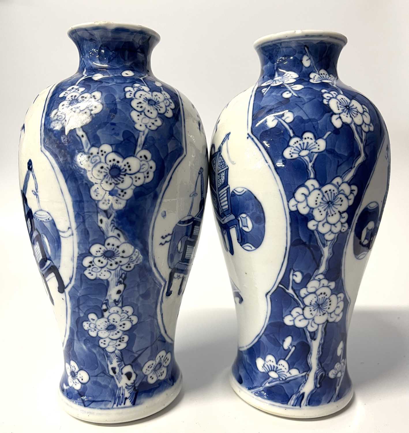 A pair of small Chinese porcelain vases in Qing Shi style with panels decorated with precious - Image 4 of 8