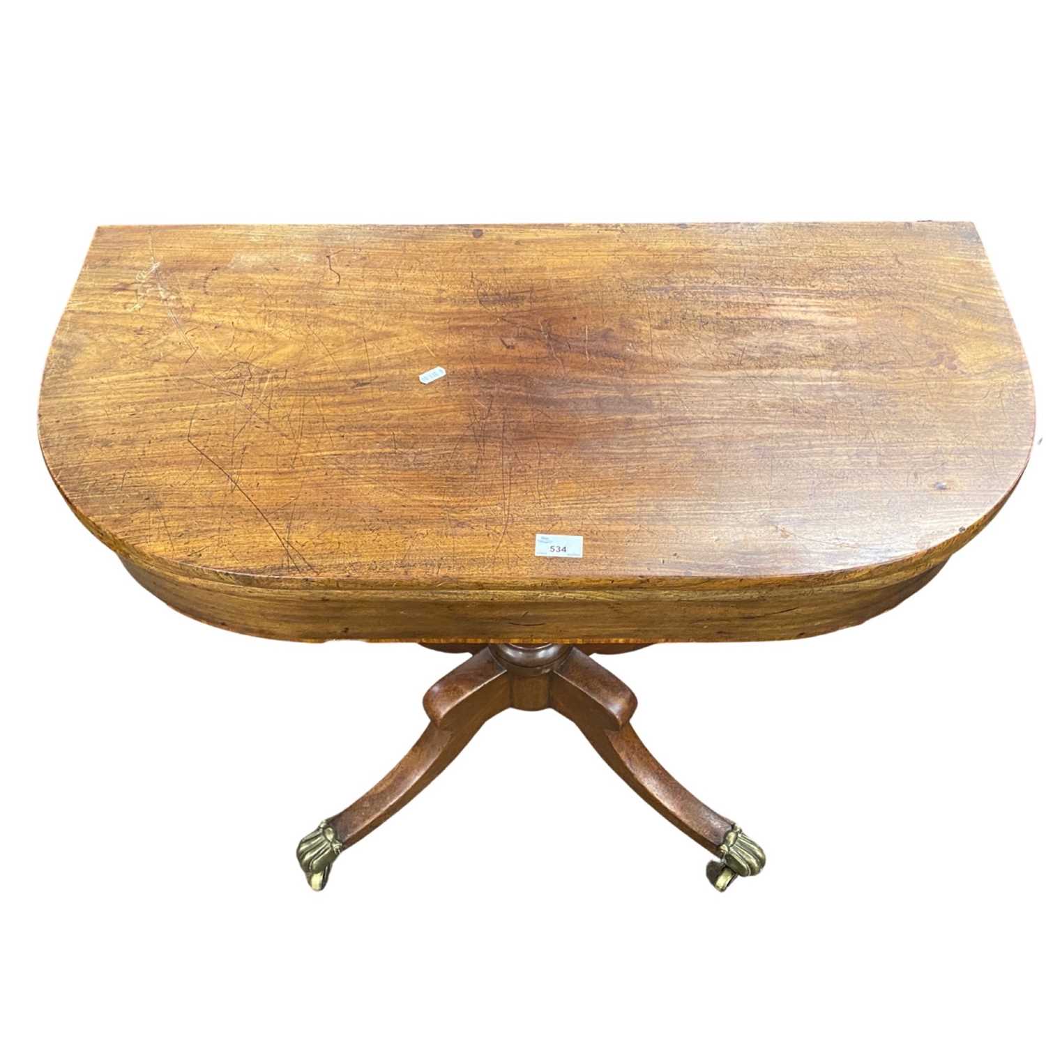 A 19th Century mahogany pedestal tea table with folding top over a turned column and outswept legs - Image 3 of 4