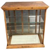 Late 19th or early 20th Century pine framed and glazed shop counter display cabinet with sliding