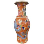 Chinese porcelain vase late 19th Century, the coral ground with polychrome decoration of a dragon