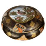 Japanese porcelain box and cover, the brown ground with gilt panelled decoration, the cover with