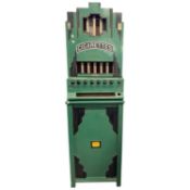 Rowe, New York, USA, a vintage cigarette dispensing machine in floor standing green and black