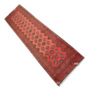 20th Century Pakistani wool runner carpet decorated with central panel of lozenges on a