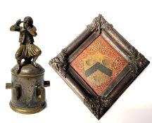 A vintage bell, the handle modelled with a Persian figure, together with an antique painted coat