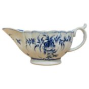 A Worcester porcelain sauce boat with blue and white design (restored)