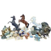 A quantity of horse sculptures, mainly stallions, some by Franklin Mint