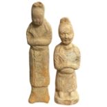 Pair of Song or Tang Dynasty attendant figures, largest 20cm high