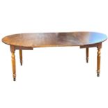 Oak and elm circular dining table raised on two tapering legs together with two accompanying