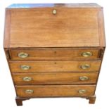 Early 19th Century red walnut bureau with full front opening to a fitted interior with small drawers