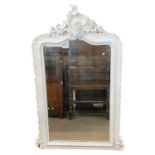 19th Century over mantel mirror of arched form set in a white painted foliate mounted frame, 132cm