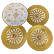 Three Aynsley Orchard Gold plates, the centres decorated with fruit, signed by D Jones together with