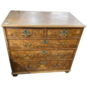 18th Century walnut chest of two short and three long drawers fitted with brass swan neck handles