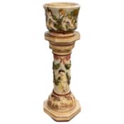 Naples Capodimonte jardiniere and stand decorated with bacchanalian figures, 80cm high