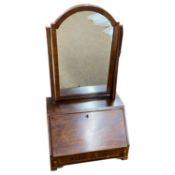 An unusual mahogany combination dressing table mirror and table top bureau in the Georgian style
