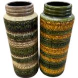Two West German pottery tall vases with typical designs, 42cm high