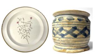 A cream ware Botanical dish with title verso in red together with a pottery jar