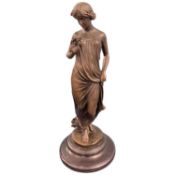 A bronzed metal figurine of an Art Nouveau lady signed Pittalaga, 35cm high