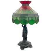 Tiffany style metal figural table lamp and shade, 60cm high