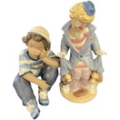 Lladro model of a clown together with a Lladro model of a young boy with baseball cap, the clown